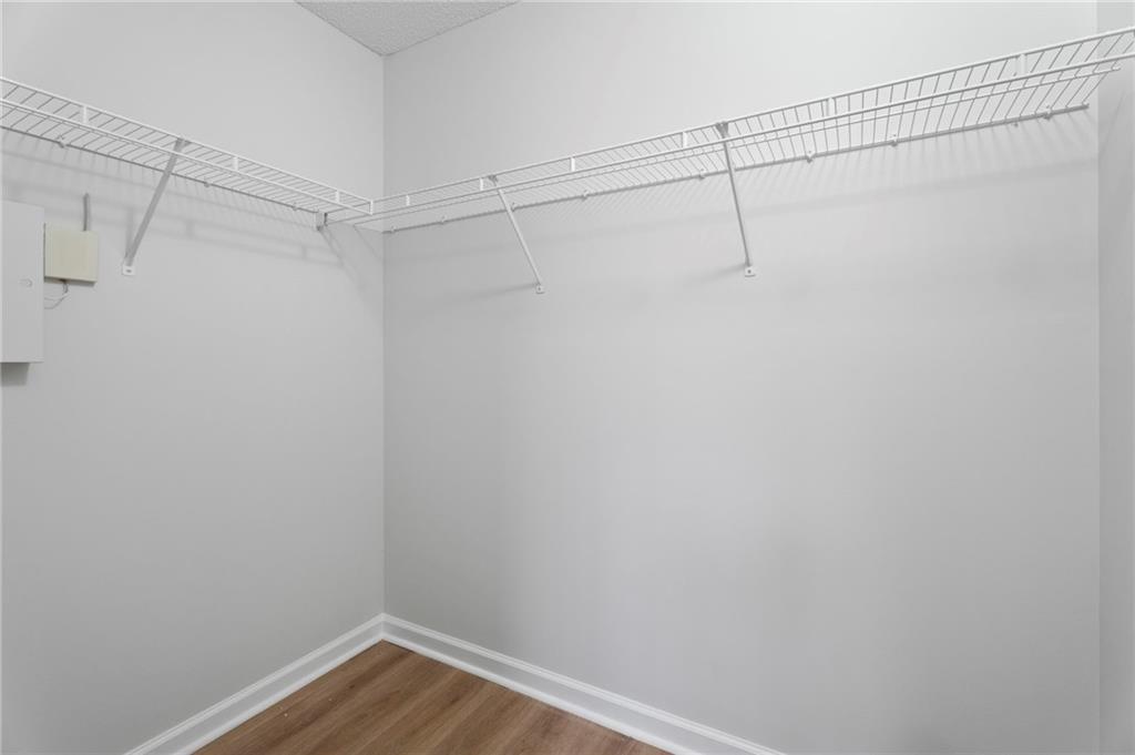 7815 Ridge Top Terrace Douglasville, GA 30134 - Photo 6 of 31 a view of a room with racks on the wall