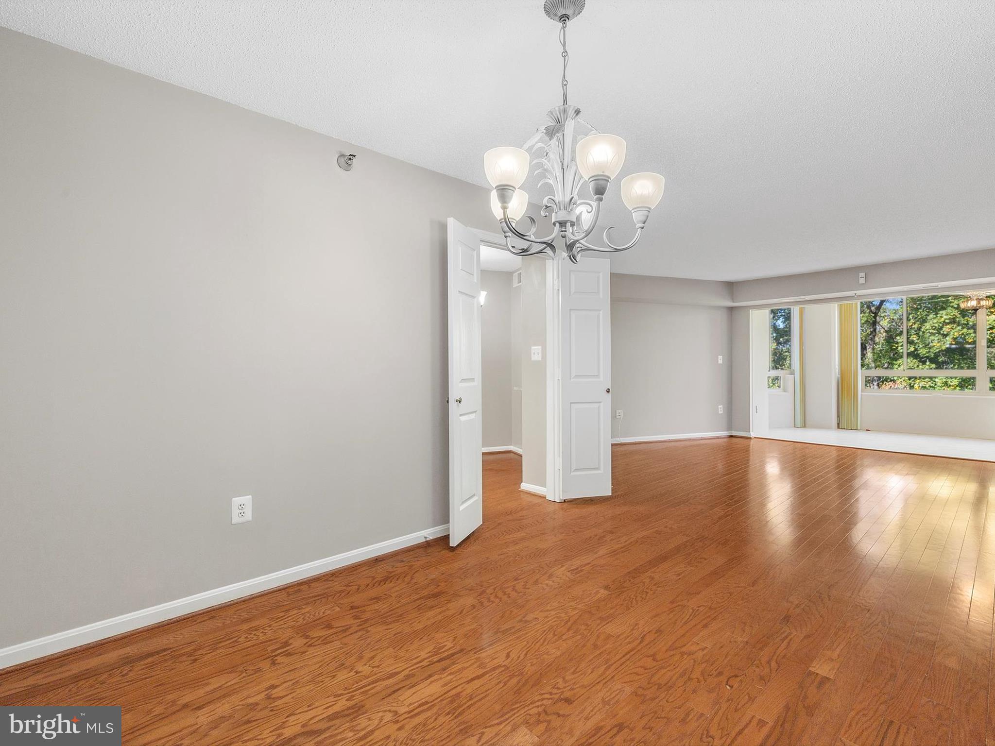 14809 Pennfield Circle, Unit 406 Silver Spring, MD 20906 - Photo 13 of 45 a view of an empty room with a window