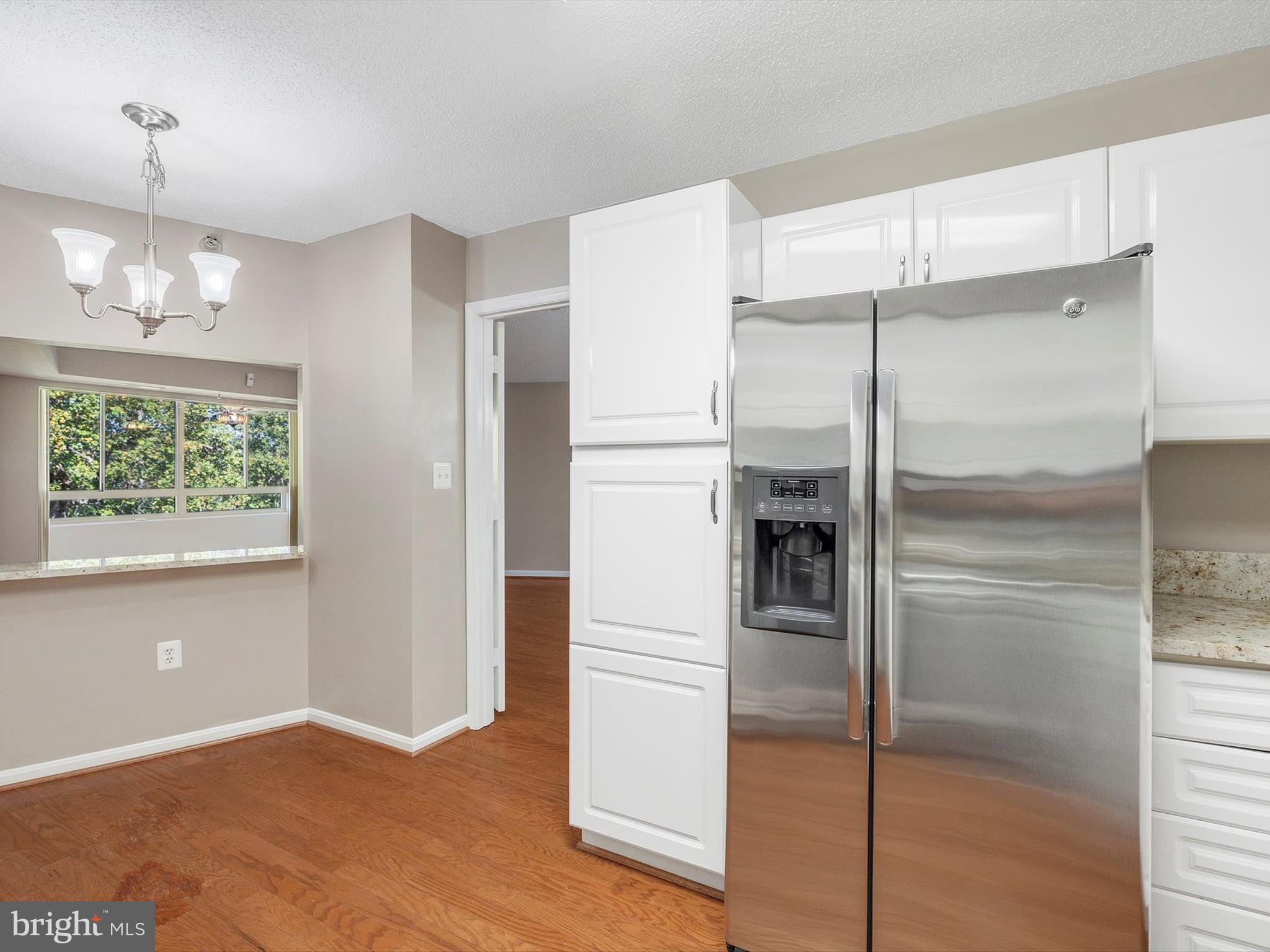 14809 Pennfield Circle, Unit 406 Silver Spring, MD 20906 - Photo 20 of 45 a kitchen with a refrigerator and a refrigerator