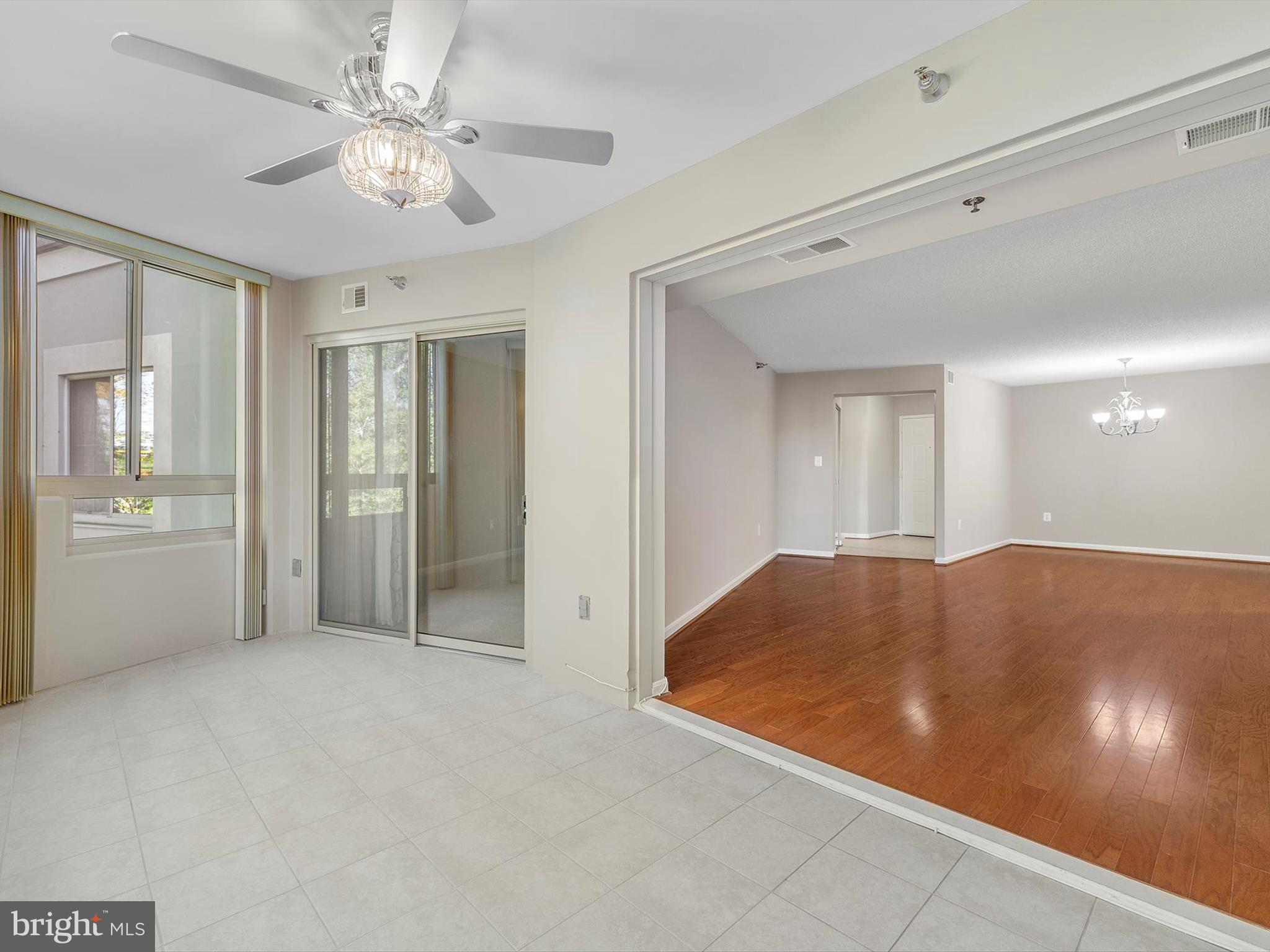14809 Pennfield Circle, Unit 406 Silver Spring, MD 20906 - Photo 24 of 45 a view of a livingroom with a chandelier