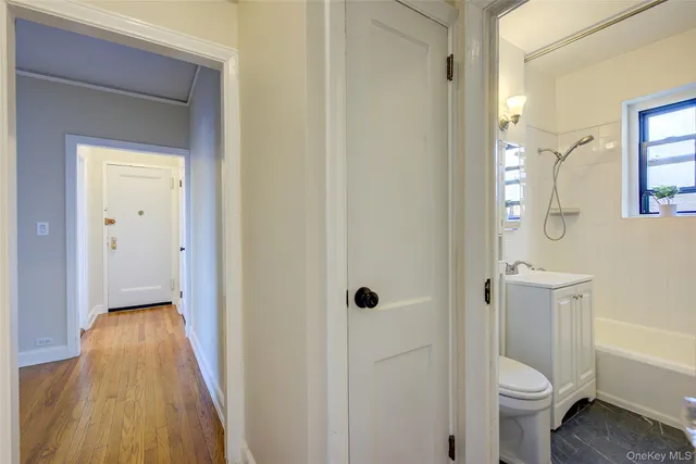 a bathroom with a toilet and a sink