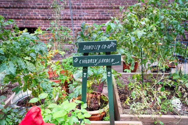 a swimming pool with outdoor seating and yard