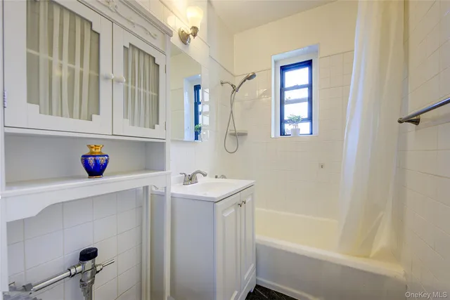 a view of a pathway with a yard