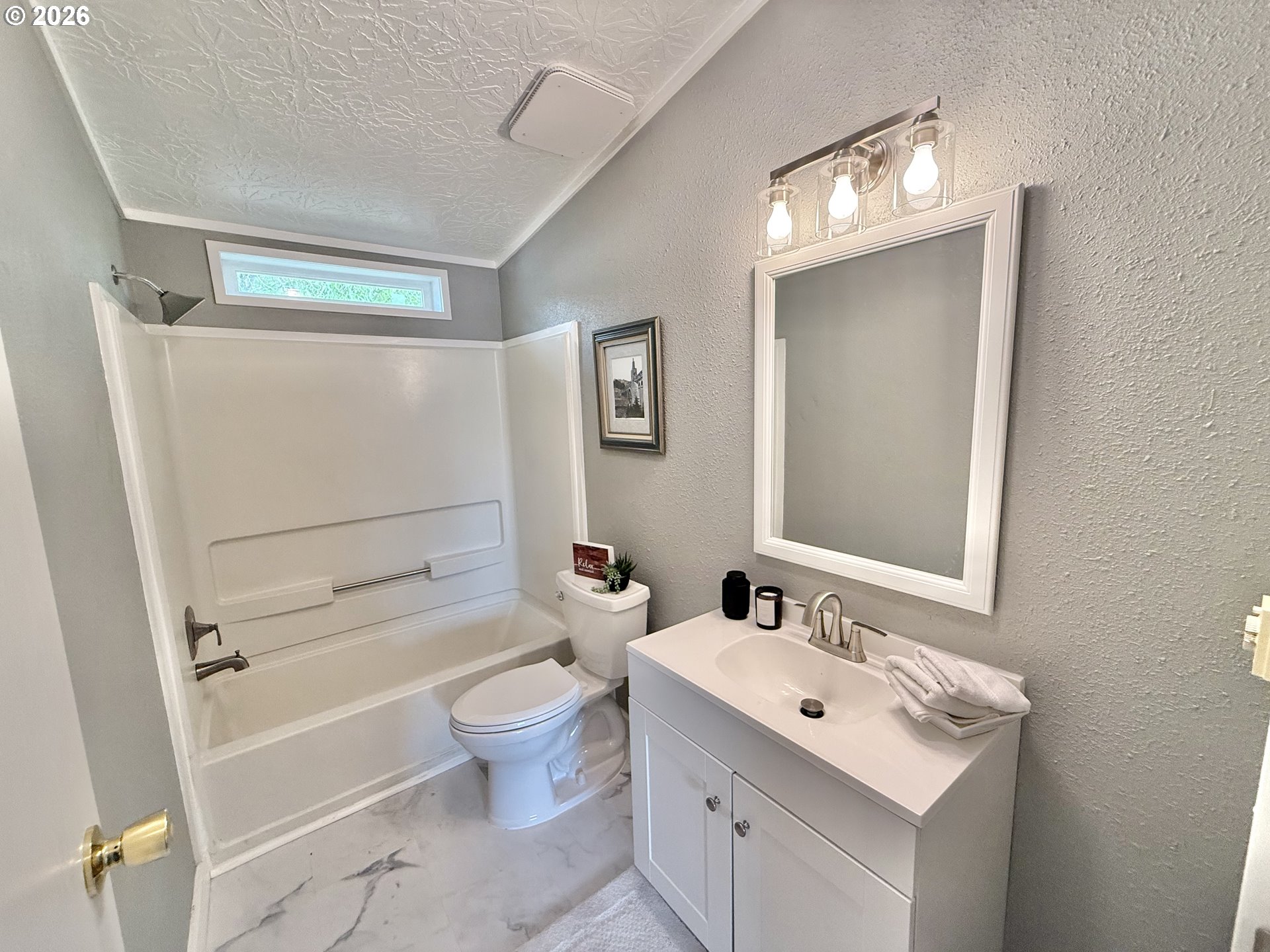 1282 3rd Street, Unit 37 Lafayette, OR 97127 - Photo 20 of 28 a bathroom with a sink toilet tub and shower