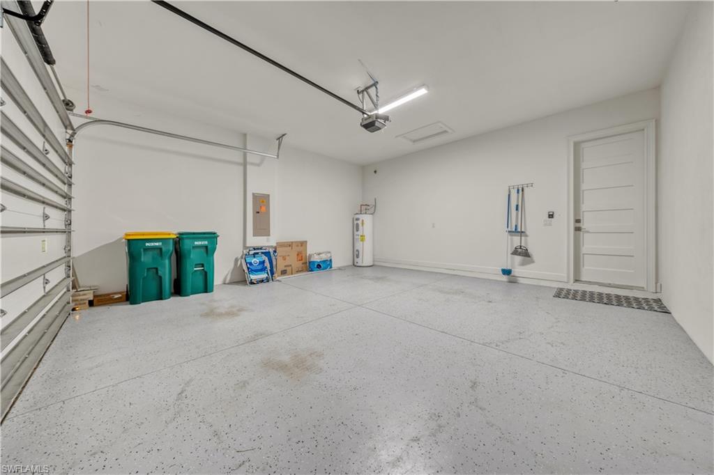 6421 Carnival Road Naples, FL 34113 - Photo 25 of 28 a view of a livingroom with furniture and a fireplace
