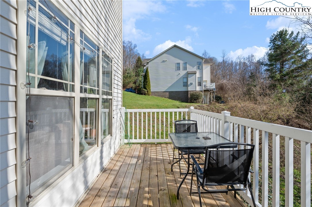 166 Azor Court, Unit 2A Boone, NC 28607 - Photo 12 of 38 a view of a chair and table in the balcony