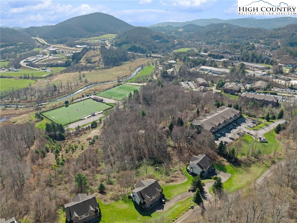 166 Azor Court, Unit 2A Boone, NC 28607 - Photo 36 of 38 an aerial view of a house with a yard