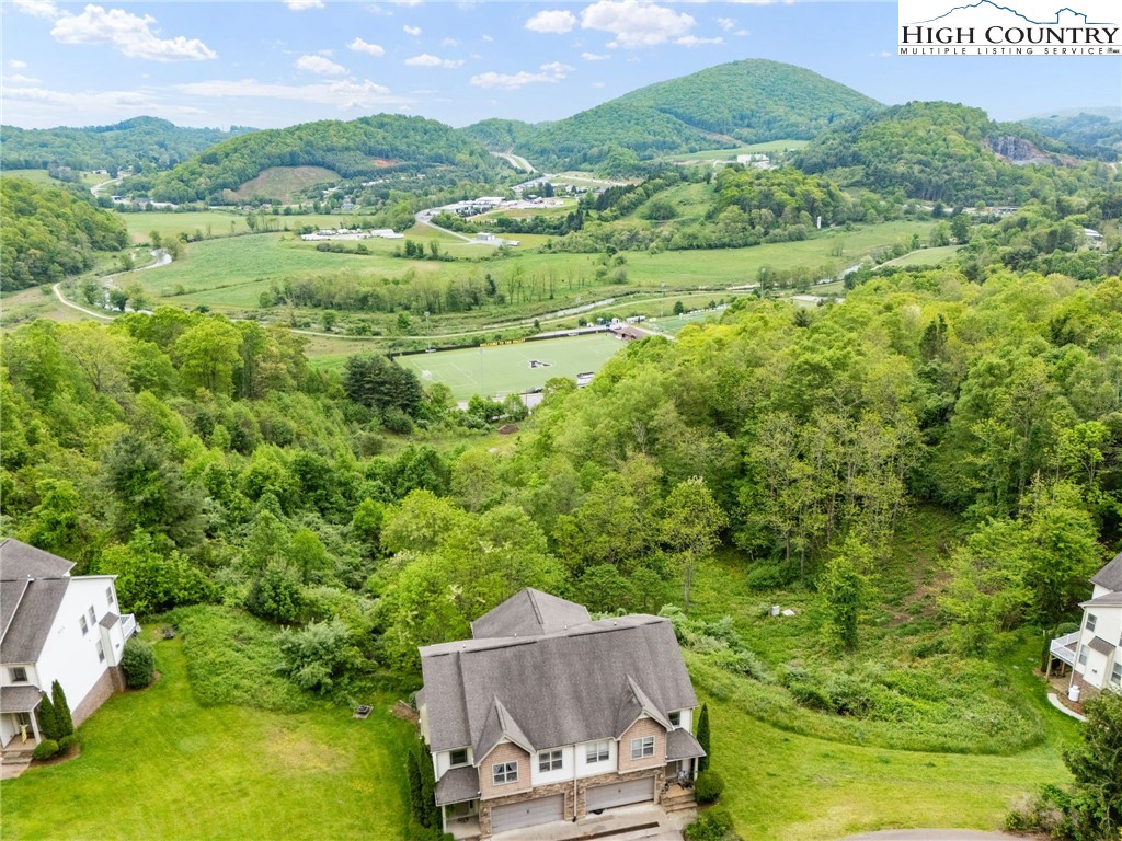 166 Azor Court, Unit 2A Boone, NC 28607 - Photo 37 of 38 an aerial view of a house with a yard