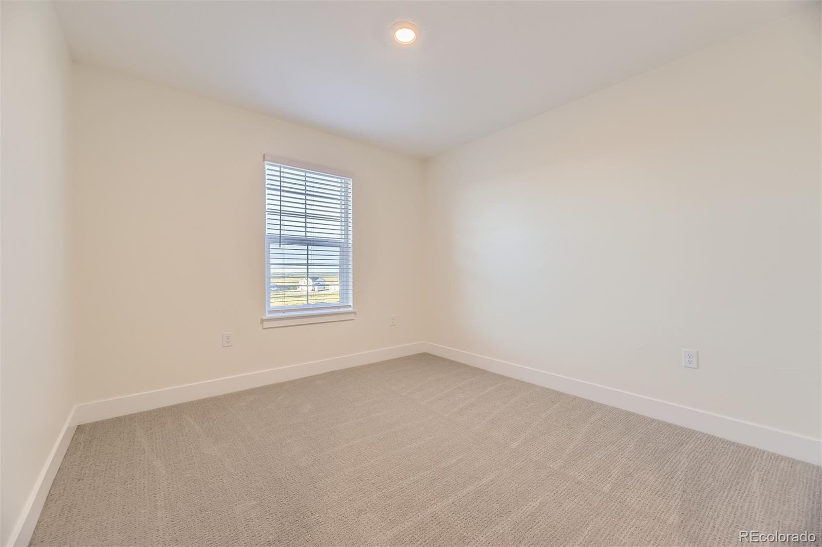 42972 Colonial Trail Elizabeth, CO 80107 - Photo 17 of 27 an empty room with a window