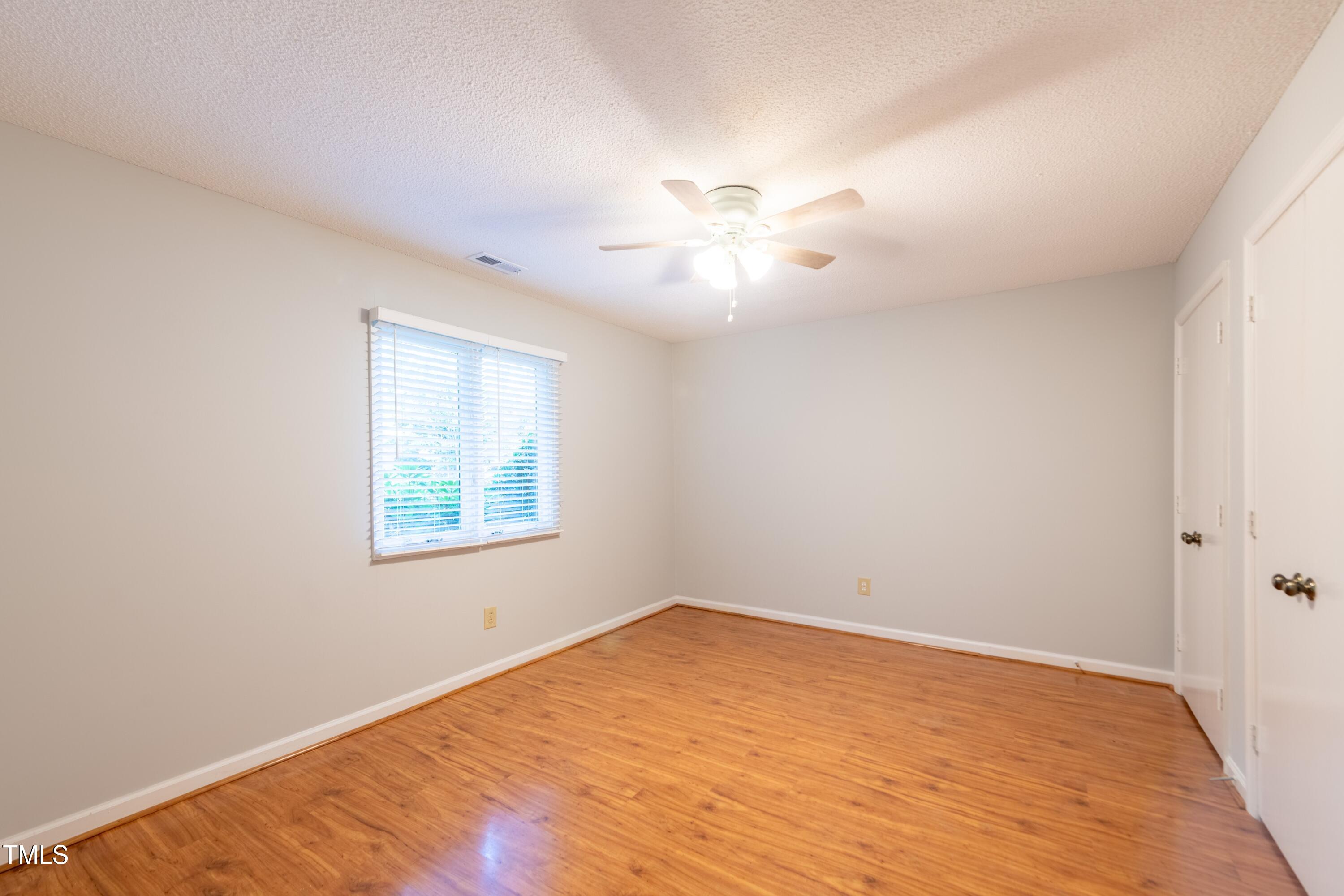 7910 Yester Court Raleigh, NC 27615 - Photo 18 of 24 Third Bedroom