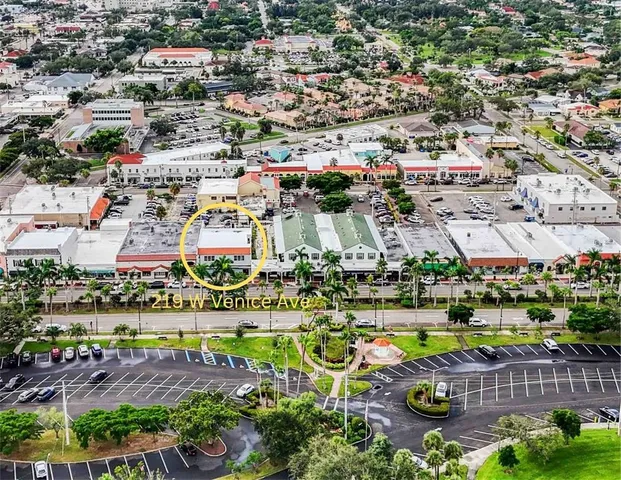 an aerial view of a swimming pool and an outdoor space