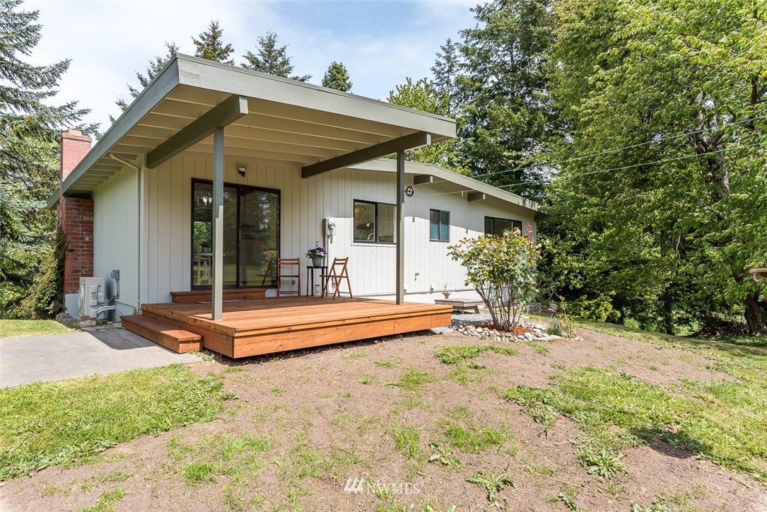3235 Bay Road Ferndale, WA 98248 - Photo 22 of 40 a view of a house with backyard and sitting area