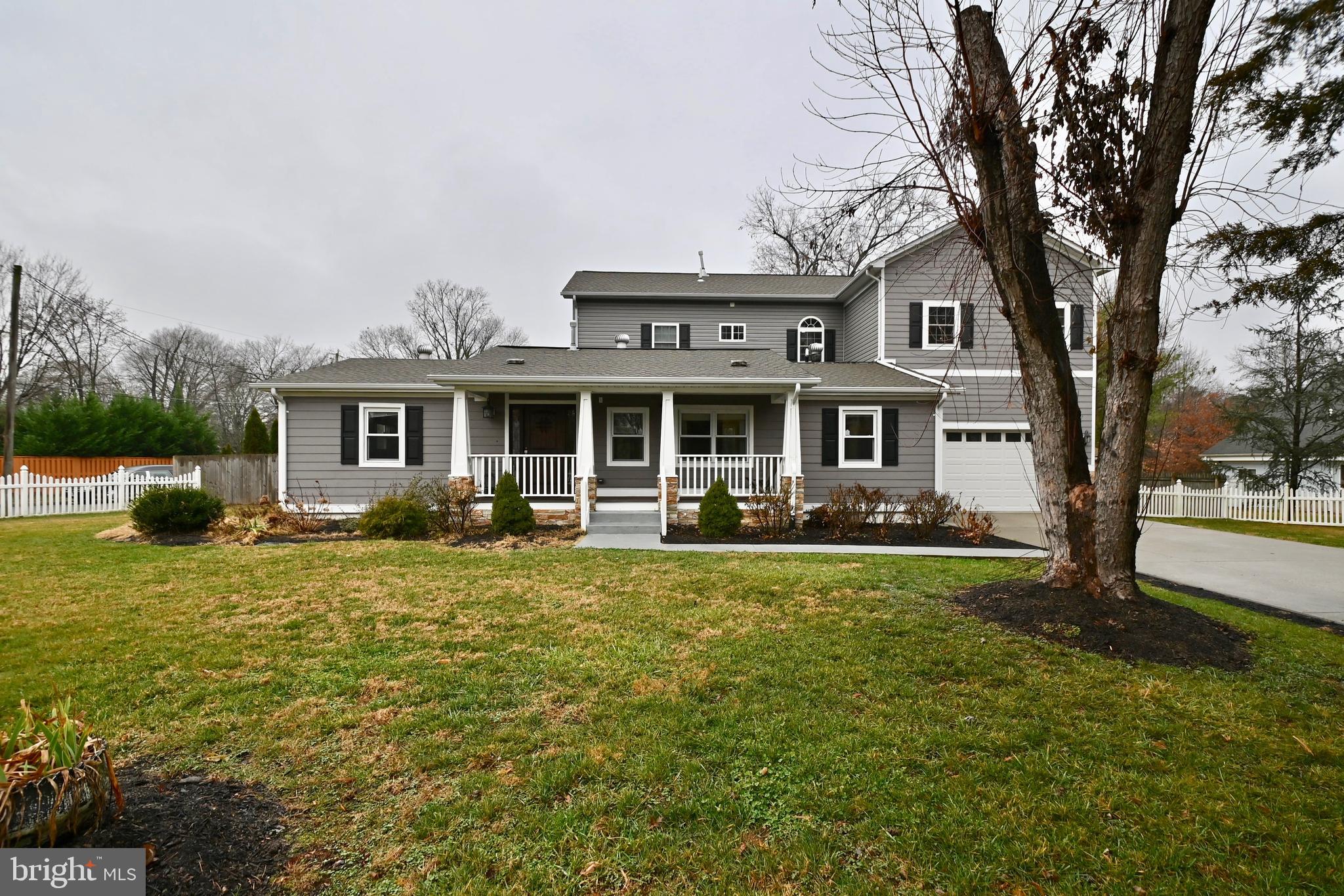 Deep driveway and inviting porch front