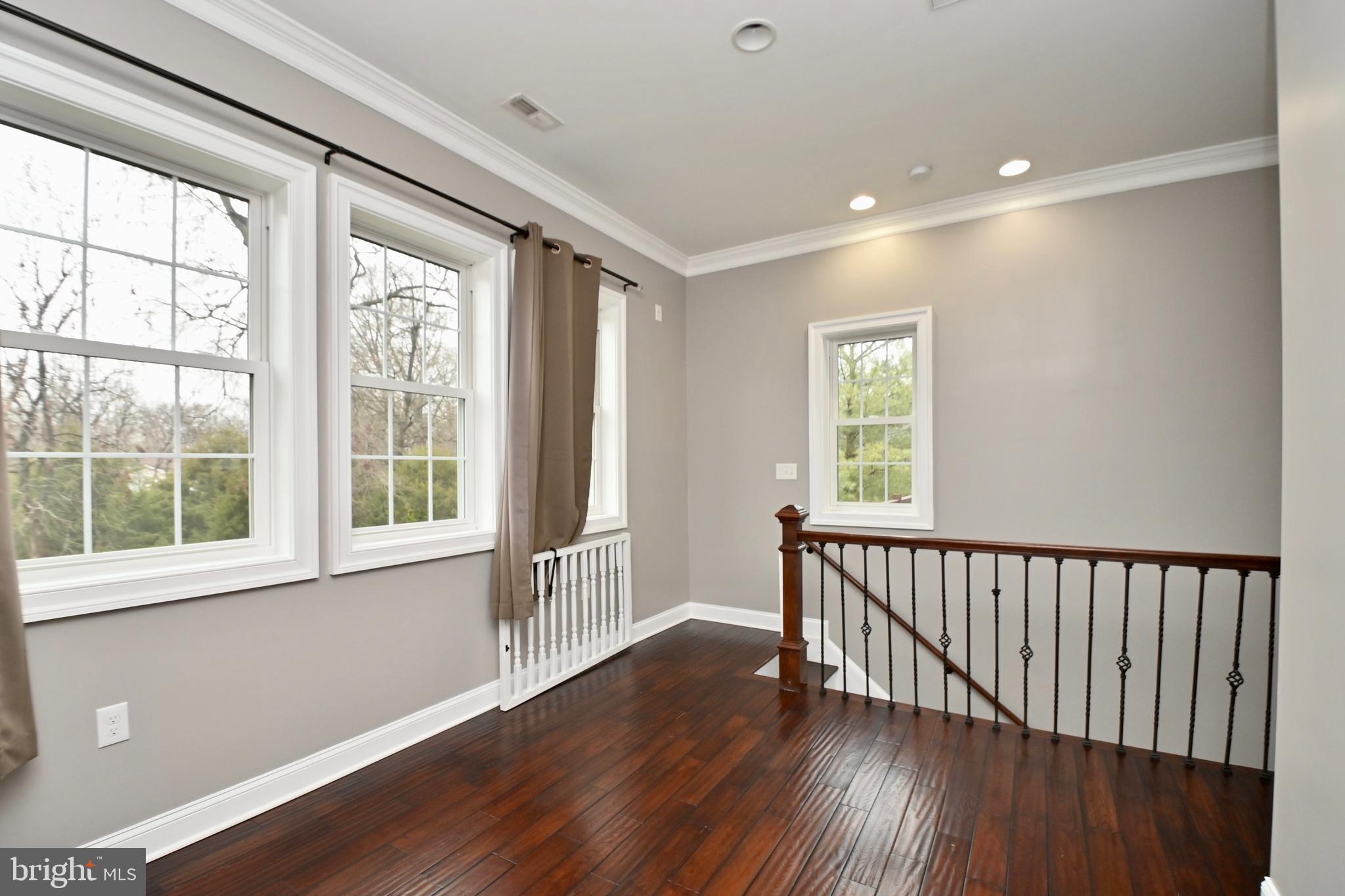 8018 Fordson Road Alexandria, VA 22306 - Photo 30 of 54 Top of stairs wrought iron stylish decor