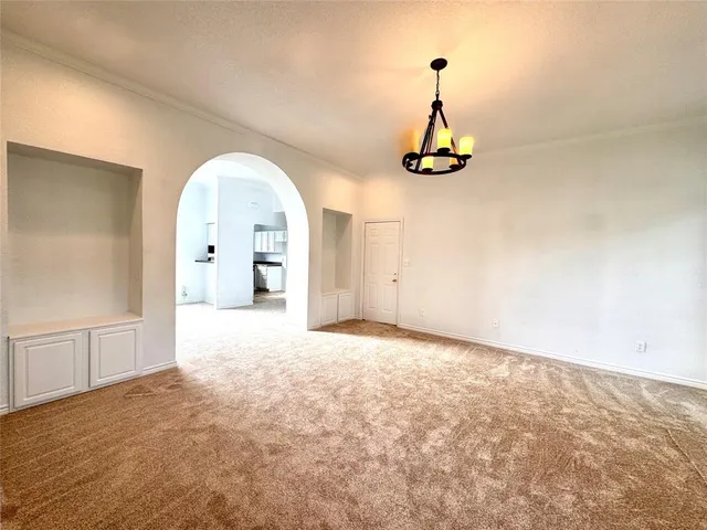 a view of empty room with a window