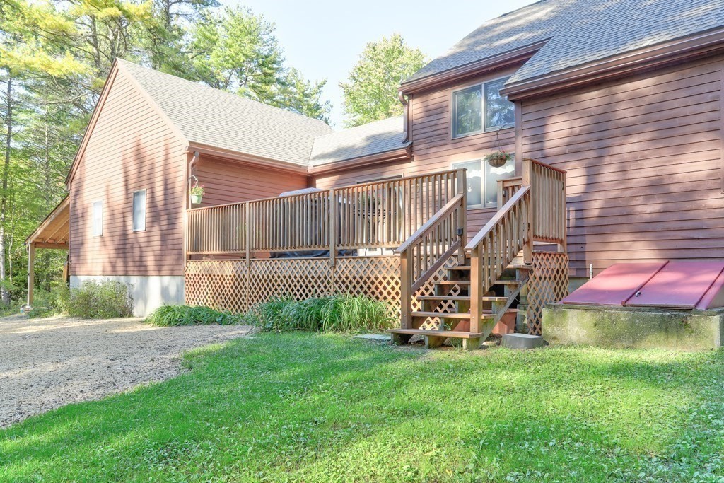 291 Mountain Road Gill, MA 01354 - Photo 5 of 35 a view of a house with a backyard