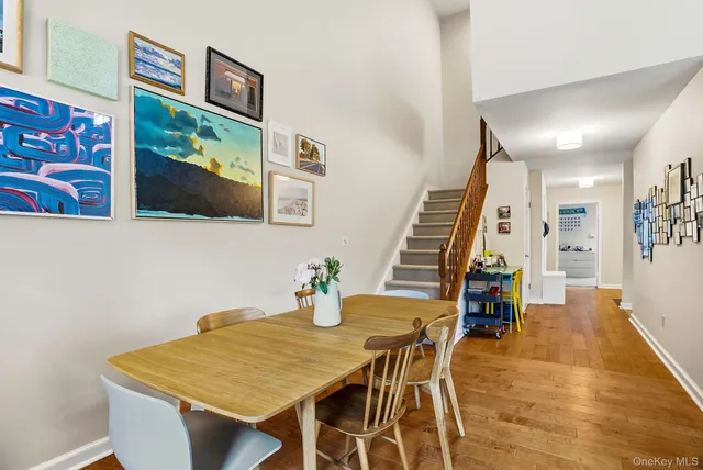 a living room with furniture and flat screen tv