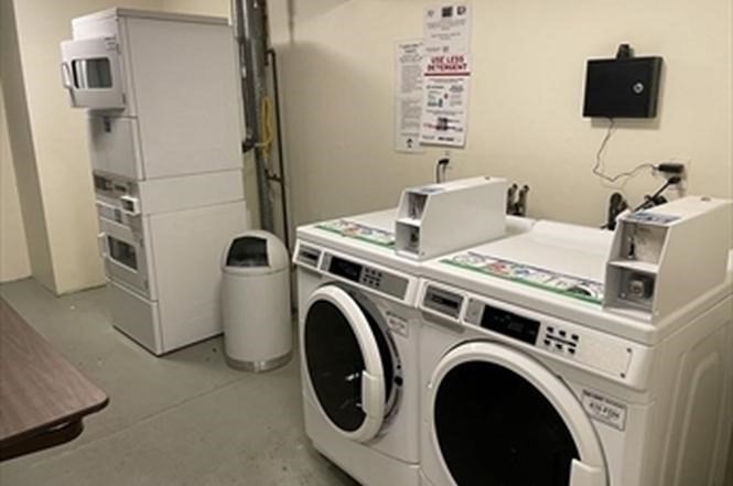 71 Nicholas Road, Unit H Framingham, MA 01701 - Photo 22 of 29 a utility room with dryer and washer
