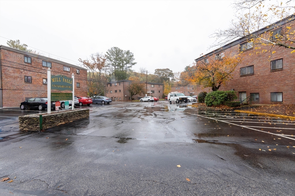 71 Nicholas Road, Unit H Framingham, MA 01701 - Photo 27 of 29 a view of a street with cars