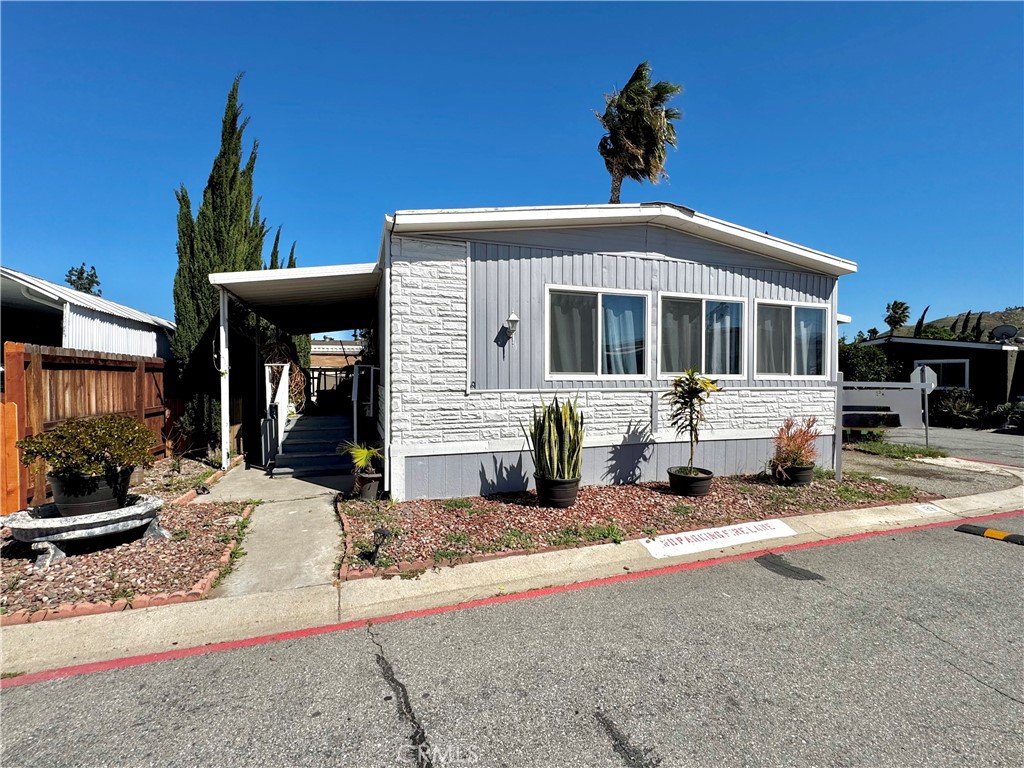 a front view of a house with a porch