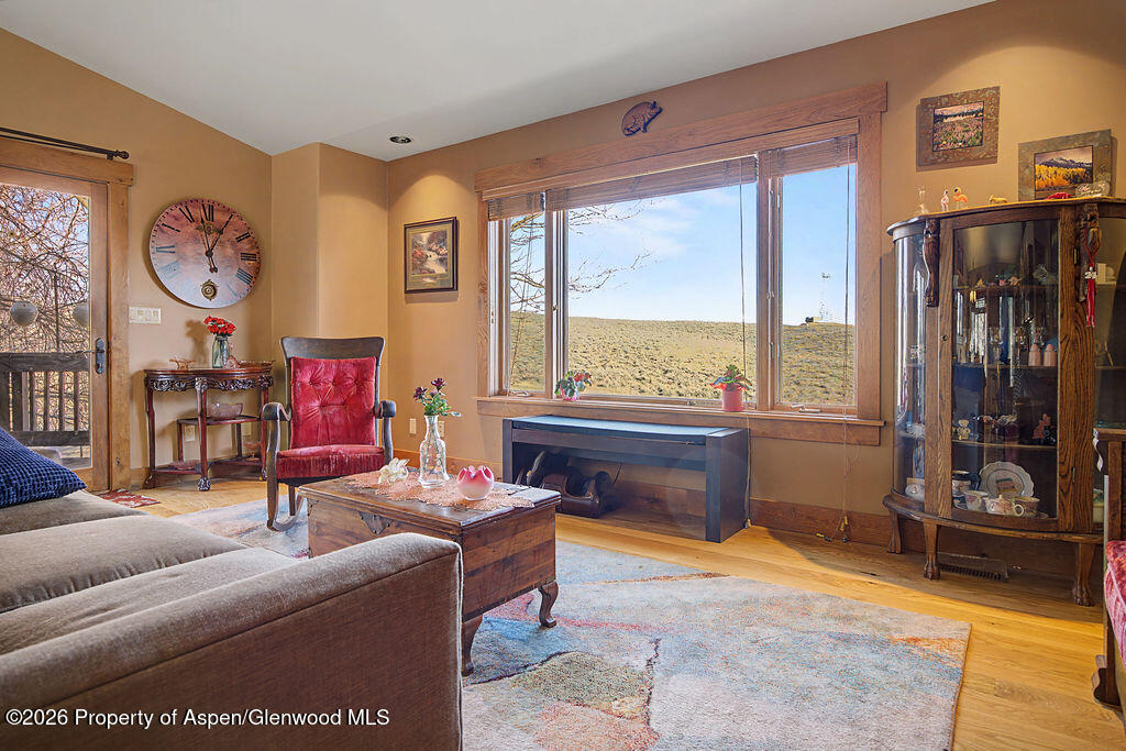 1040 Bryan Way Craig, CO 81625 - Photo 14 of 54 a living room with furniture and a large window