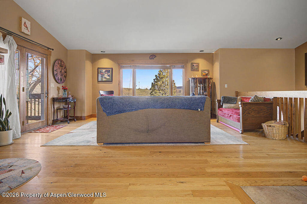1040 Bryan Way Craig, CO 81625 - Photo 15 of 54 a living room with furniture and wooden floor