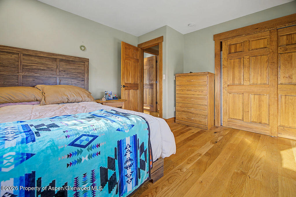 1040 Bryan Way Craig, CO 81625 - Photo 17 of 54 a bedroom with a bed and a window