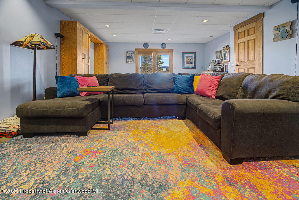 1040 Bryan Way Craig, CO 81625 - Photo 23 of 54 a living room with furniture and a couch