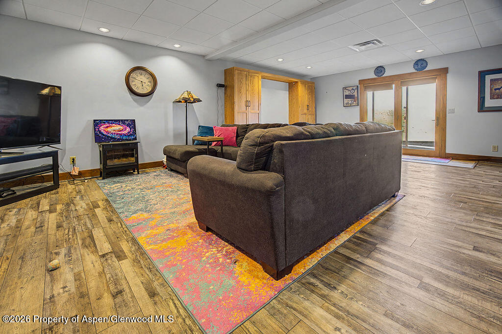 1040 Bryan Way Craig, CO 81625 - Photo 28 of 54 a living room with furniture and a flat screen tv