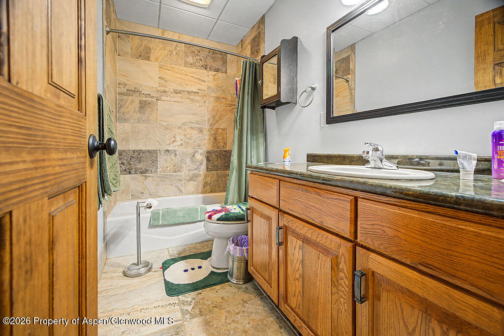 1040 Bryan Way Craig, CO 81625 - Photo 30 of 54 a bathroom with a sink and a mirror