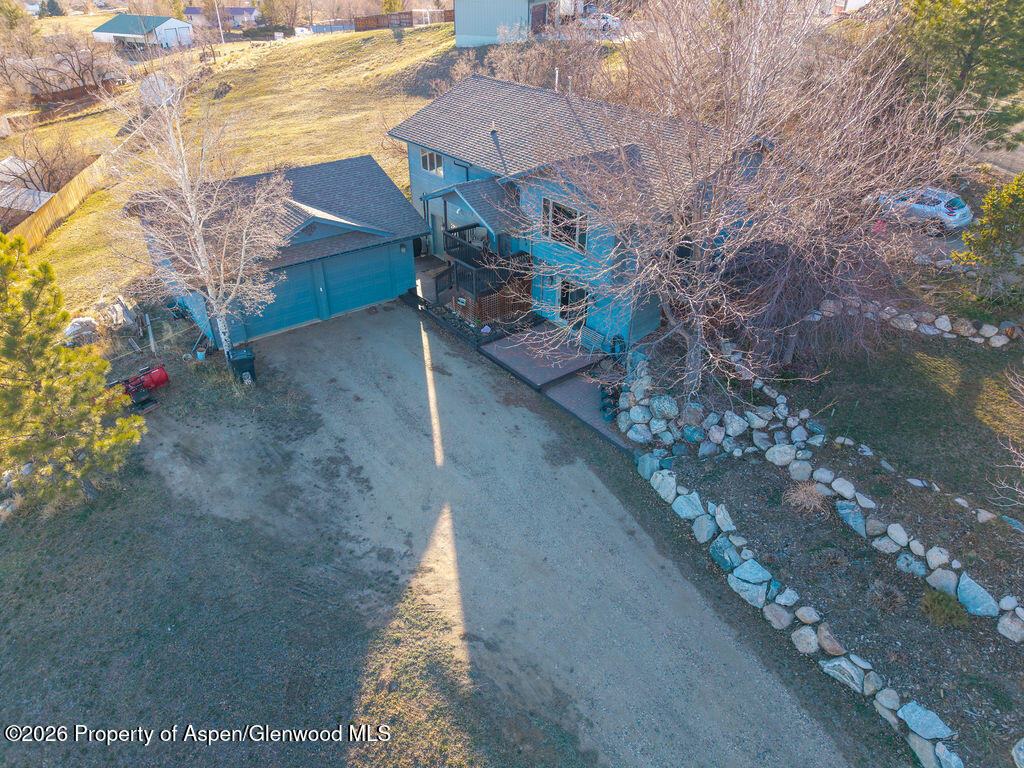 1040 Bryan Way Craig, CO 81625 - Photo 40 of 54 a view of a yard with an outdoor space
