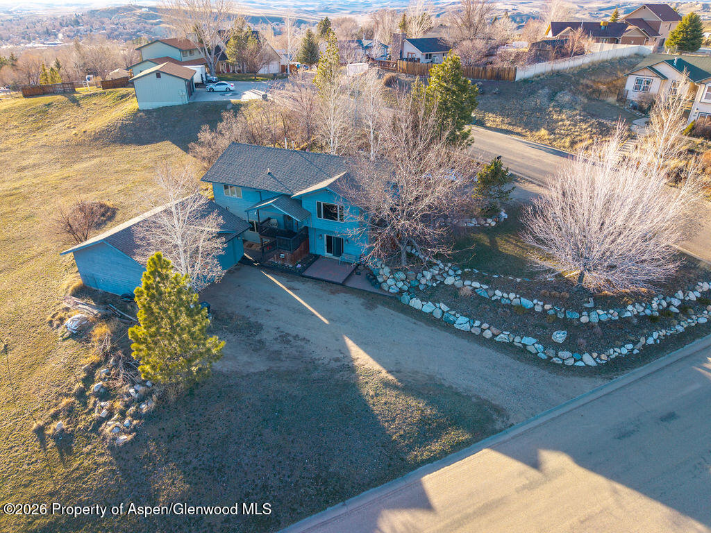 1040 Bryan Way Craig, CO 81625 - Photo 42 of 54 an aerial view of residential houses with outdoor space