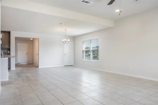 a house view with a backyard space
