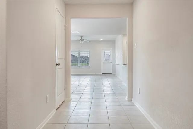 a kitchen with stainless steel appliances granite countertop a refrigerator stove and sink