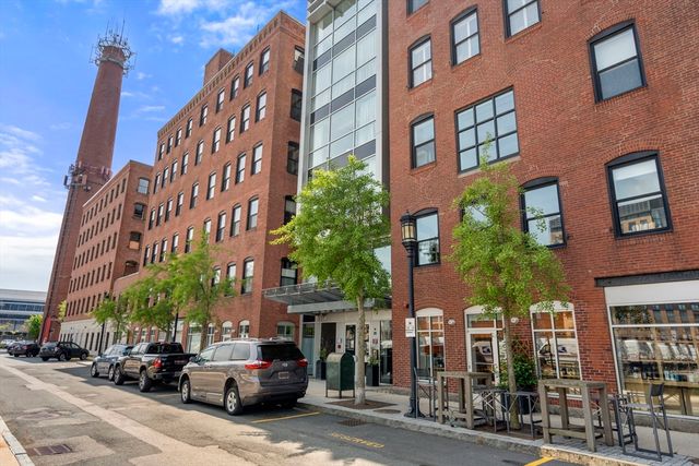 a view of a park with large trees
