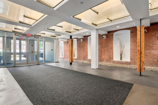 a view of a lobby with furniture