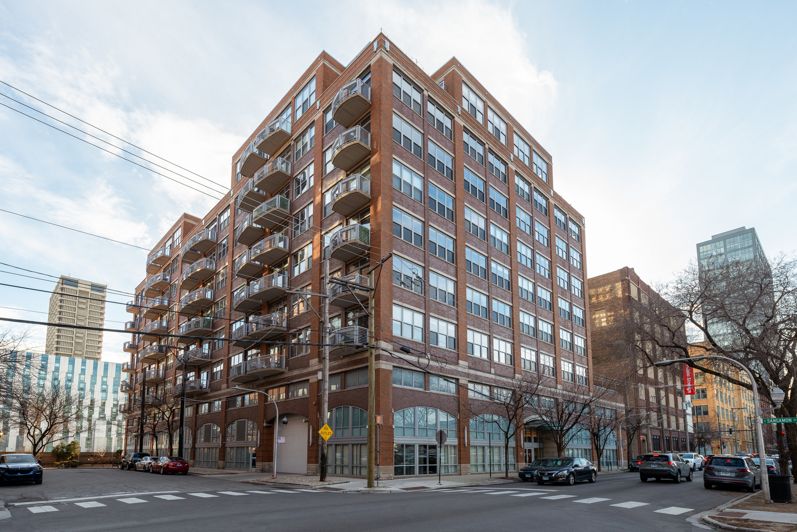 933 West Van Buren Street, Unit 824 Chicago, IL 60607 - Photo 1 of 18 a view of a building with a street