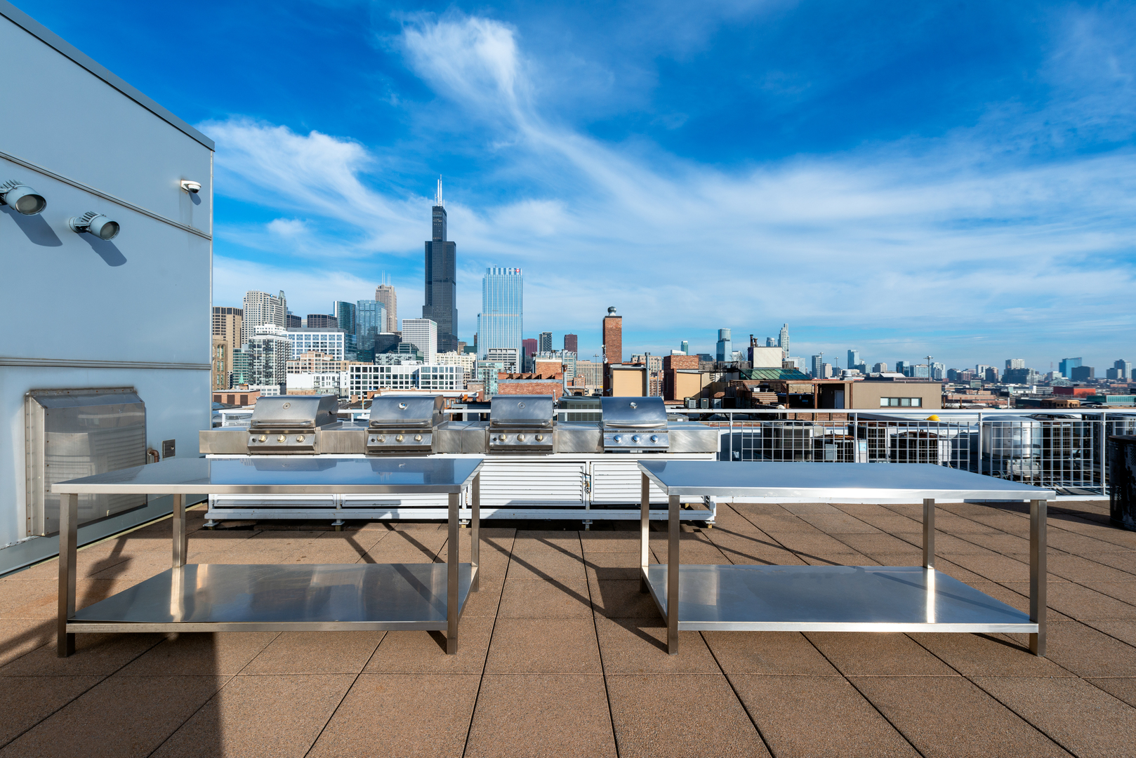 933 West Van Buren Street, Unit 824 Chicago, IL 60607 - Photo 15 of 18 a living room with lots of furniture and appliances