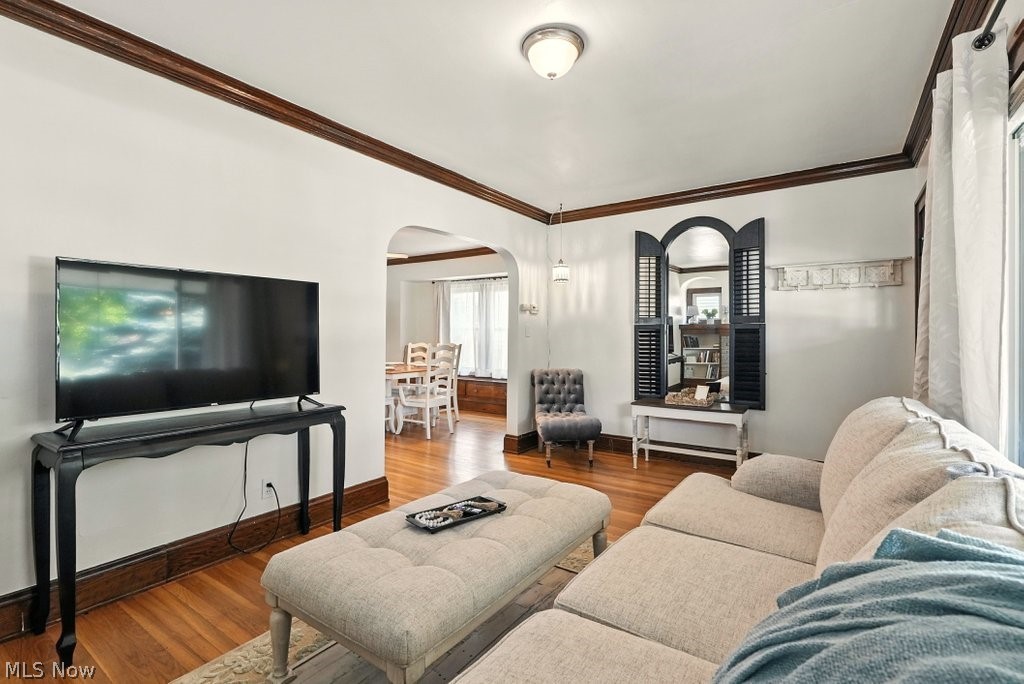 3579 Bosworth Road Cleveland, OH 44111 - Photo 24 of 39 Hardwood flooring throughout, white walls, and dark wood trim
