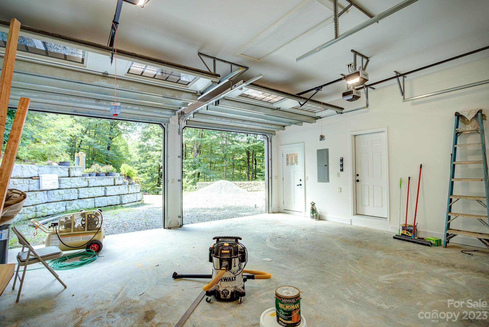 53 Laurel Ridge Lane, Unit 26 Banner Elk, NC 28604 - Photo 39 of 41 a room with gym equipment and a large window