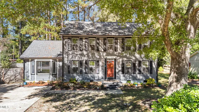 front view of house with a trees
