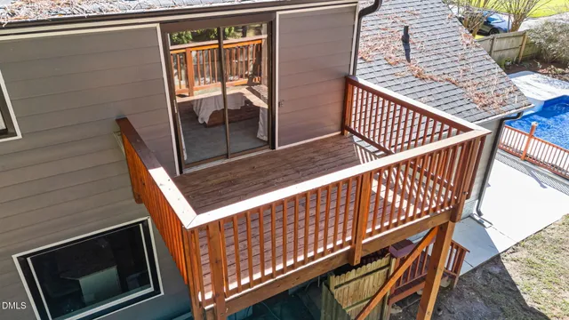 a view of a chairs and table in the patio