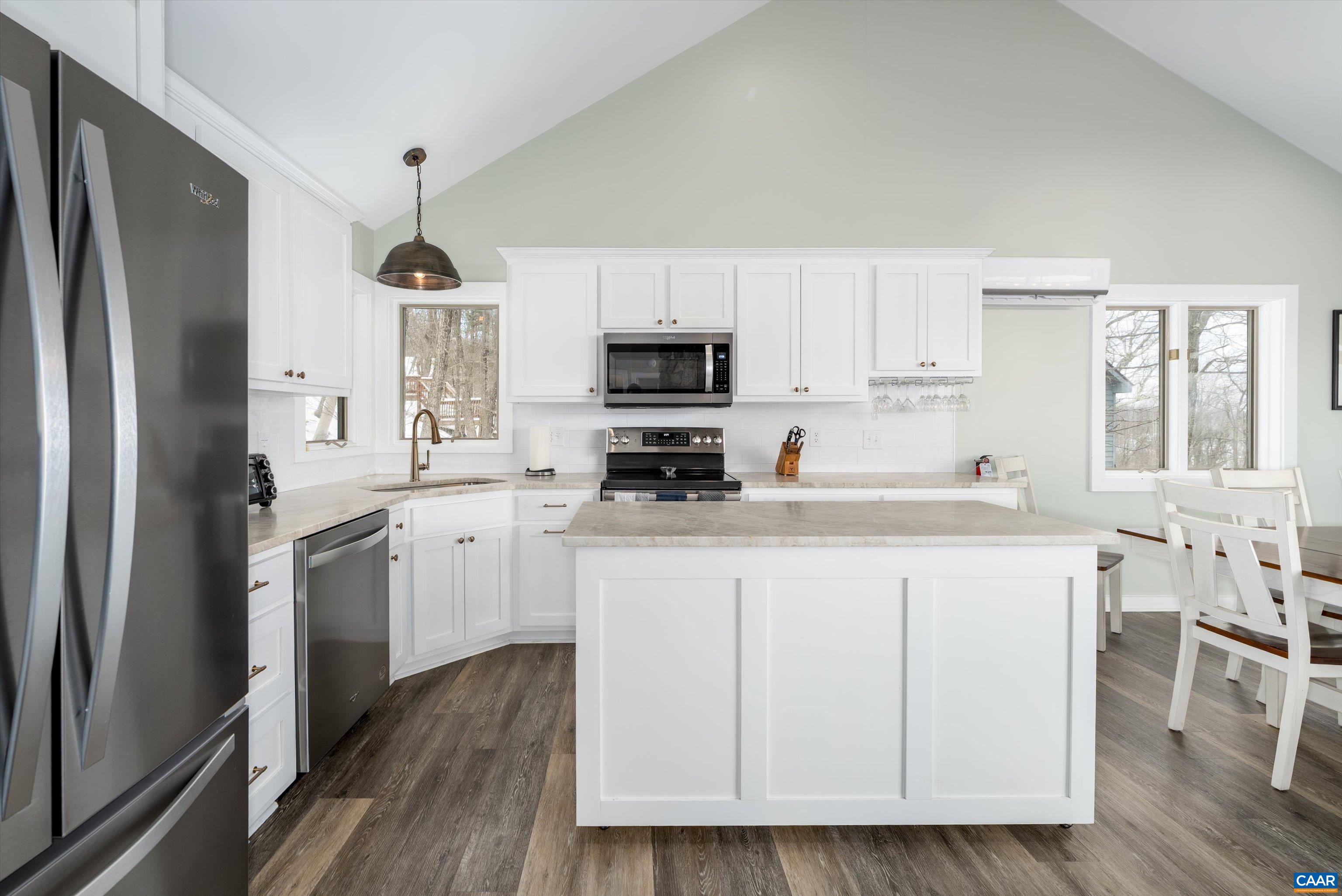 131 Crawfords Edge Wintergreen, VA 22967 - Photo 21 of 75 a kitchen with stainless steel appliances a refrigerator sink and microwave
