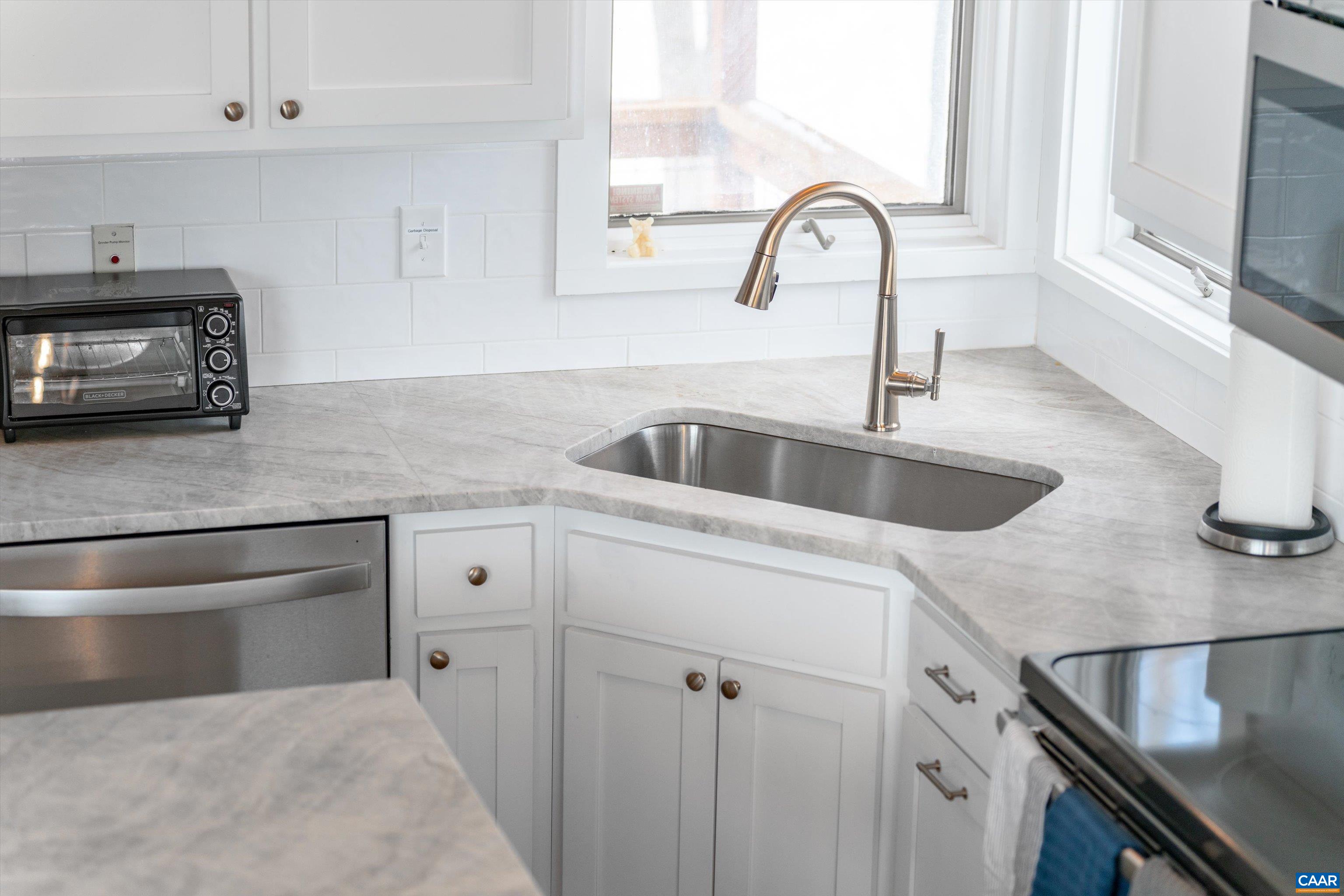 131 Crawfords Edge Wintergreen, VA 22967 - Photo 22 of 75 a view with granite countertop a sink and cabinets