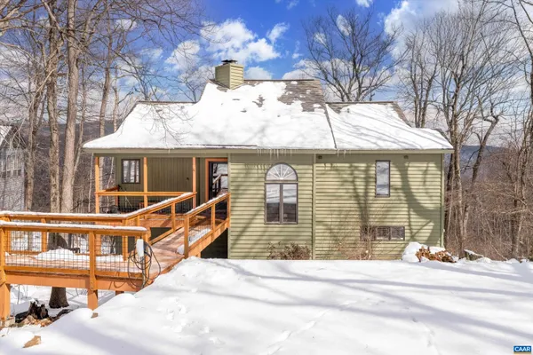 a kitchen with stainless steel appliances a refrigerator sink and cabinets