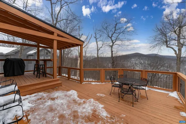 a front view of a house with parking area