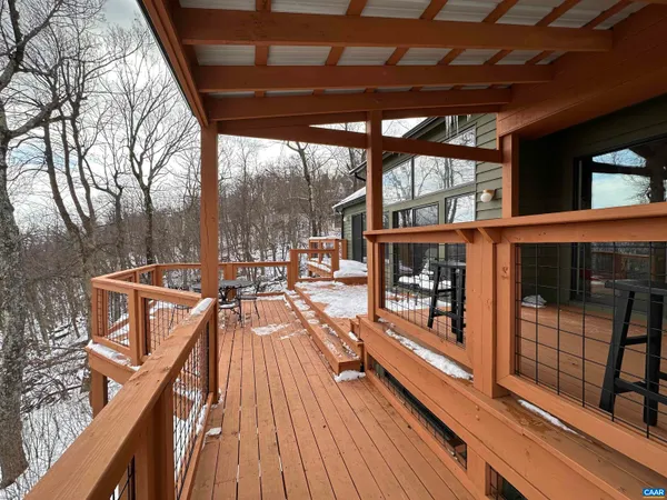a view of city with tall trees
