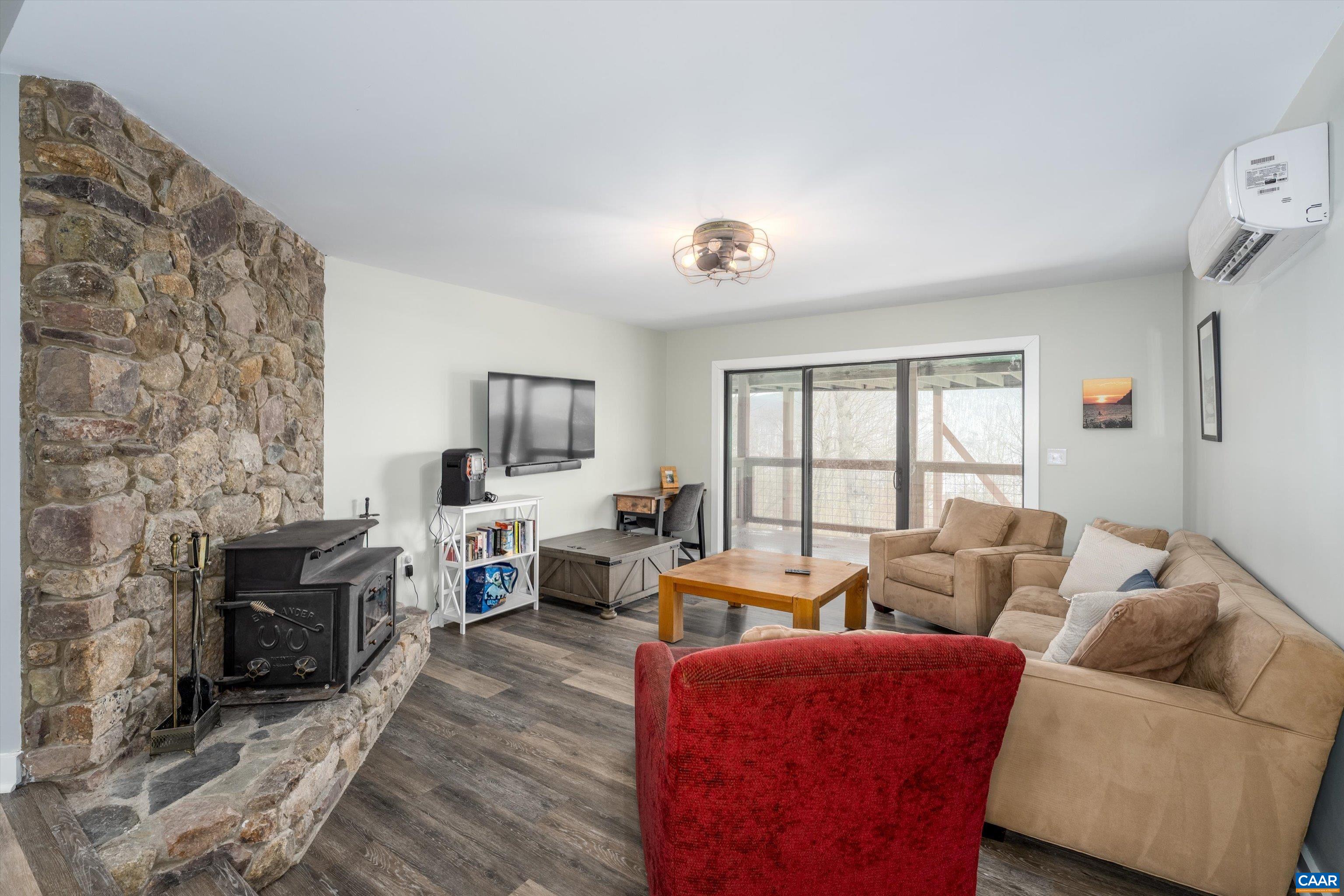 131 Crawfords Edge Wintergreen, VA 22967 - Photo 53 of 75 a living room with furniture and a fireplace