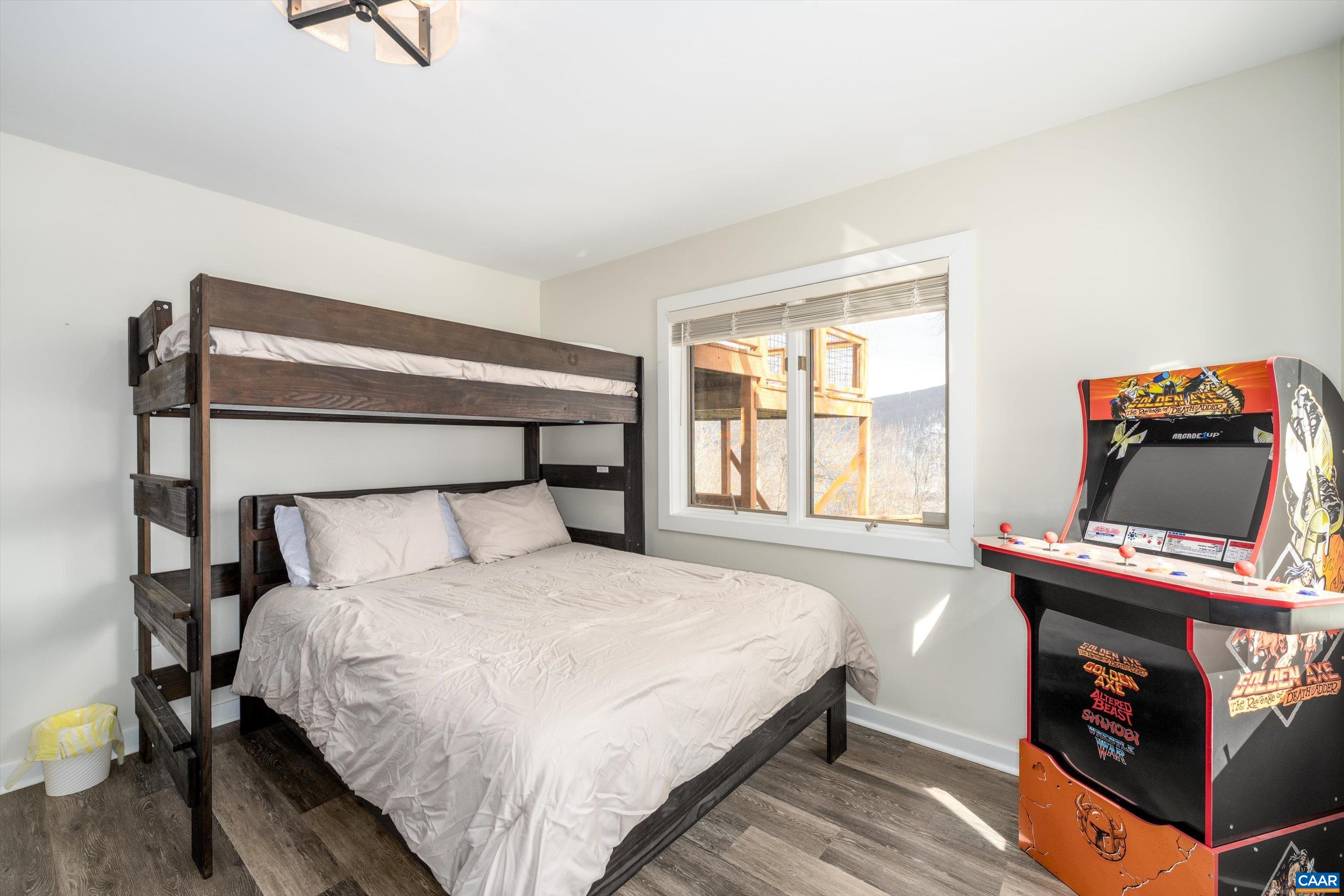 131 Crawfords Edge Wintergreen, VA 22967 - Photo 58 of 75 a bedroom with a bed and a window