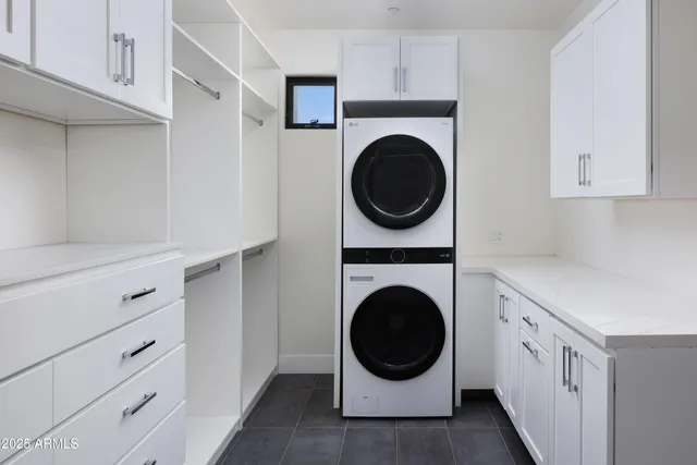 a room with cabinets and a window